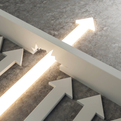 An arrow breaking through a barrier