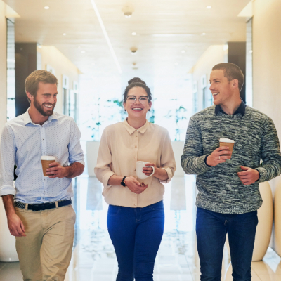 Coworkers walking and laughing