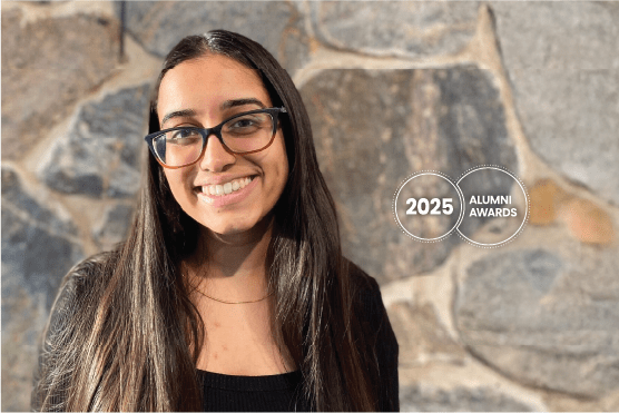 Headshot of young, smiling woman with long dark hair and 2025 Alumni Awards logo